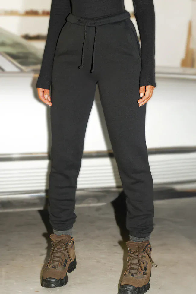 Relaxed jogger and knit styled as an airport outfit for a long flight, Tuchuzy Bondi Beach
